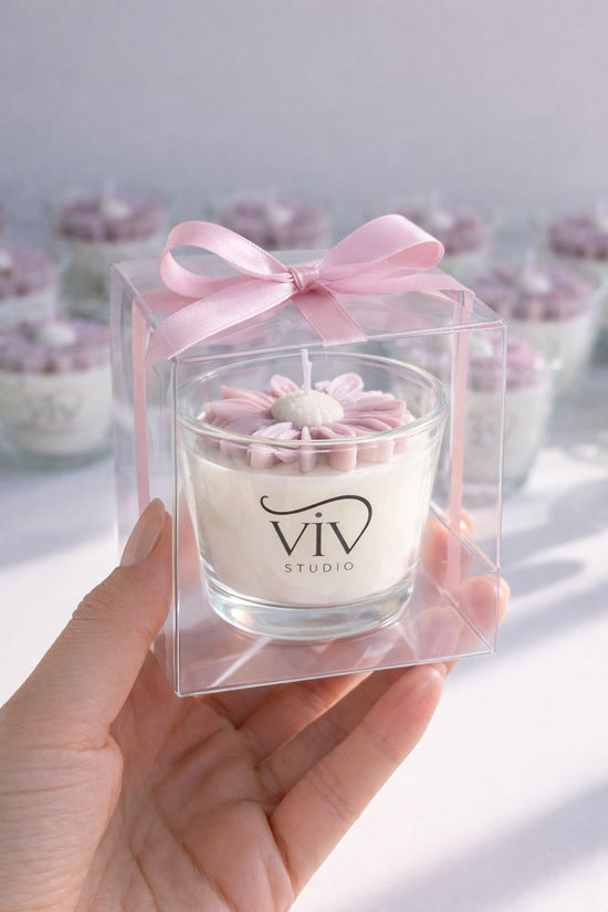Velas de frascos con margaritas