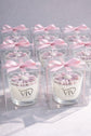Velas de frascos con margaritas