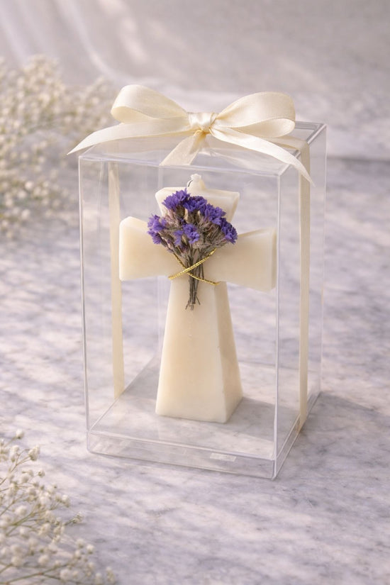 Velas de cruz con flores